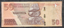 Load image into Gallery viewer, Zimbabwe Fifty Dollars Bond Note
